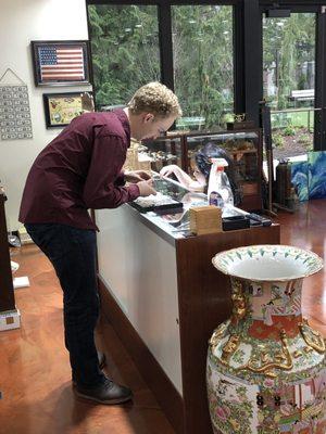 Gold Mine gentleman showing my 5 year old (who was not there to buy anything) the beautiful and expensive gems she was curious about.