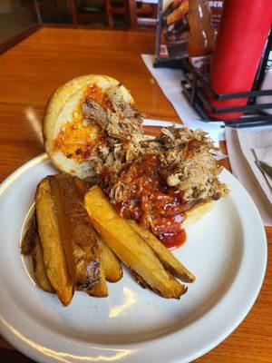 Pulled Pork Sandwich with steak fries.  Delicious