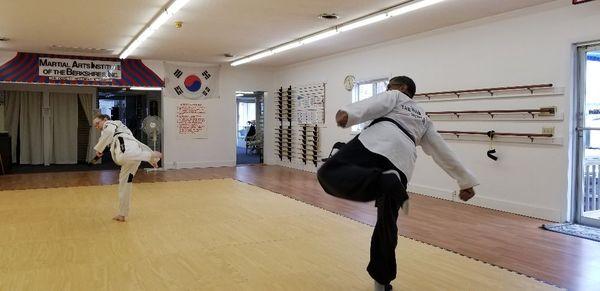 Grand Master Brown & Master Childs demonstrating hook kicks