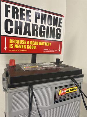 A convenient and crafty phone charging station made of Les Schwab batteries.