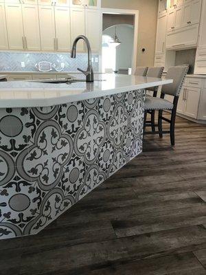 Flooring, Island skirt, and quartz counters, and tile backsplash