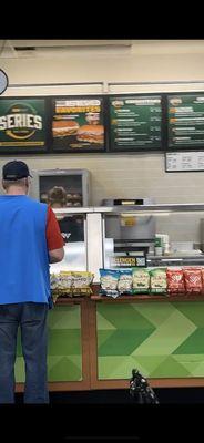 Same lady different angle subway worker