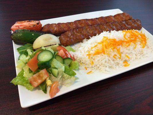 Mix Koobideh kabob.(1 chicken, 1 beef) Basmati rice, salad, grilled tomato, onion, and Jalapeño. Very tasty, everything was good.