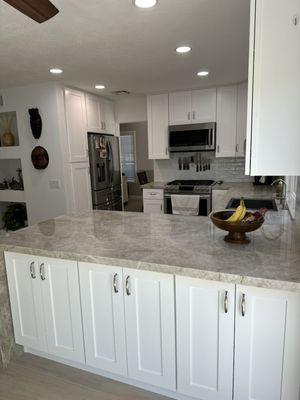 White shaker modern remodel kitchen cabinets at San Diego vanities and kitchens cabinet store quartz countertop