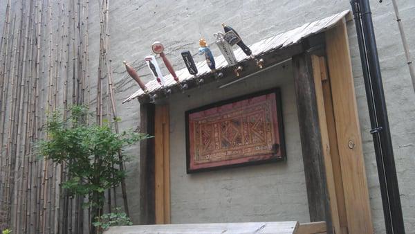 4/15/12; beer shrine in the outdoor patio.