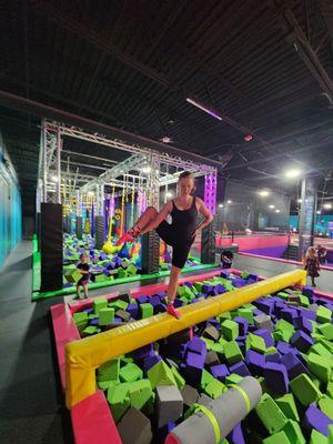 Mom trying the balance beam