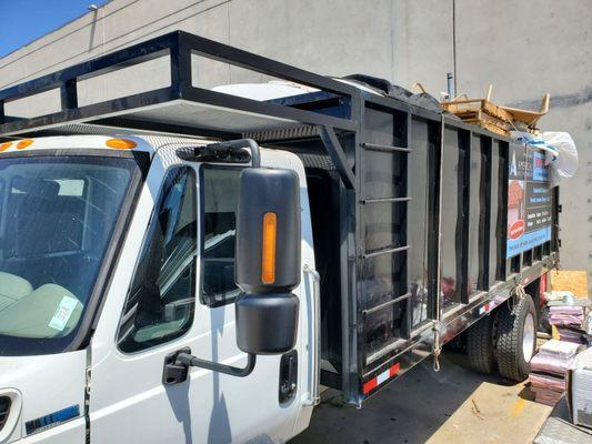 Custom rack on dump truck and custom ladder