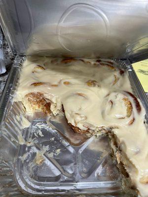 Cinnamon rolls with a butter cream cheese frosting.