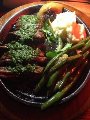 Steak with chimichurri sauce.