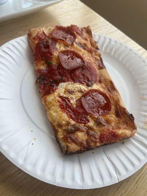 Spicy pepperoni grandma slice