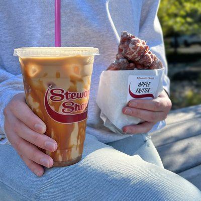 Iced coffee and an apple fritter.