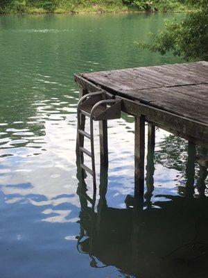 Deck with ladder for swimming