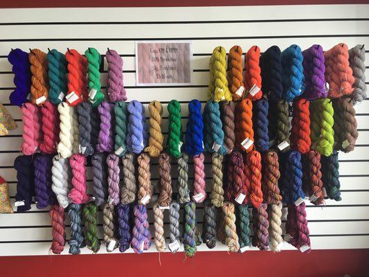 Our lovely wall of Koigu KPM and KPPPM!