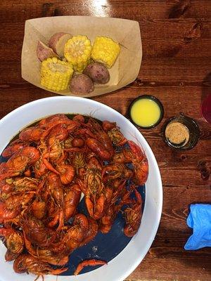 2 lbs of crawfish*butter*seasoning*corn*pots*