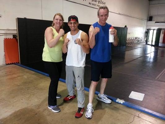 Another one of the couples who train here! MMA HIIT works for the wiser folks too!