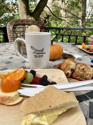 Breakfast sandwich, mini chocolate croissants, and oat maple berry scone