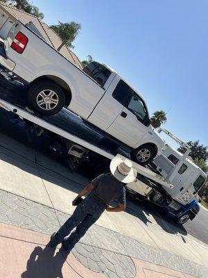 Truck being towed