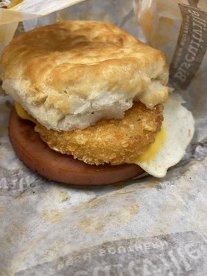 Why yes, that is a fried bologna, egg, and hash brown biscuit!