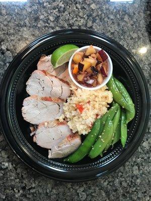 Pork tenderloin with Asian plum sauce, snap peas, and brown rice.  Only 325 Calories.  And only at the the CAST Kitchen