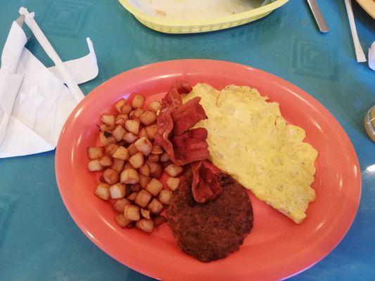 Scrambbled egos, potatoes, bacon and sausage.