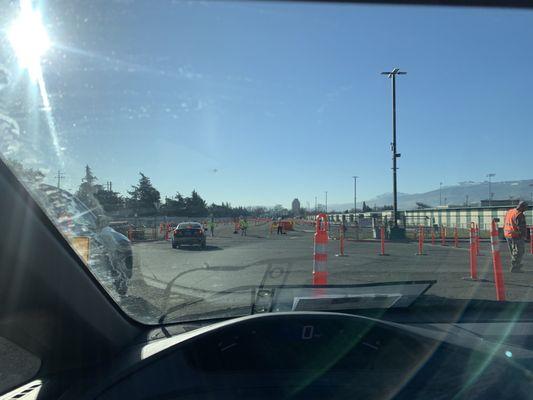 Line of cars forming for drive-thru COVID-19 testing by Washoe County Health District at the Reno Livestock Events Center.