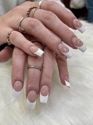 Who could resist a simply elegant French manicure? Coffin shape with chromed white tip gives a little edgy feel to it. ;)