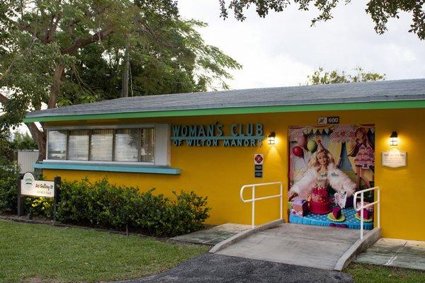 Art Gallery 21 is the yellow building with Barbie's birthday photo on the front doors! Happy 60th Birthday to Barbie!