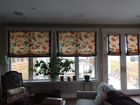 Top-down roman shades: banded and remounted.