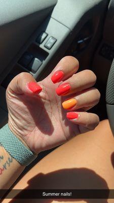 Punch mallow nail color with a pumpkin spice accent nail. Manicure