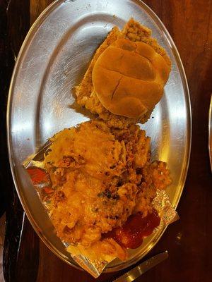 Breaded tenderloin and Waffle fries with cheese and bacon