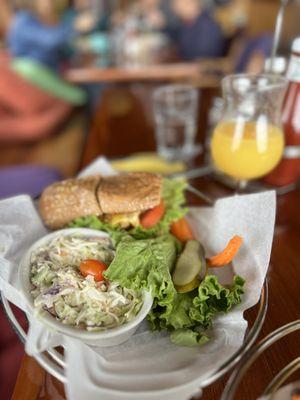 Veggie burger with coleslaw.