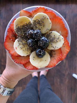 Açaí bowl in plastic bowl