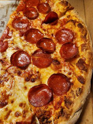 Pepperoni was delicious and perfectly greasy, thin and flexible.