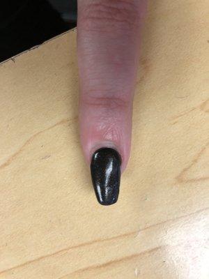 this nail had broken from the last time I had them done so he had to do it from scratch. it's incredibly uneven.