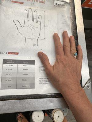 Sizing of Jerri's hand.  She prefers undersized grip but scientifically, it makes sense now.