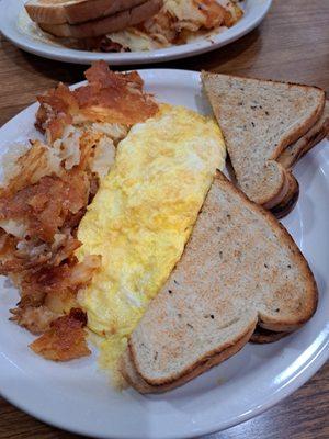 Mozzarella cheese omlette,  rye toast and home fries