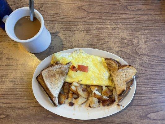 Three egged Omelet with sausage, tomato, and cheese! With a side of grilled home fries and wheat toast