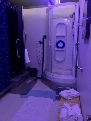 Float room -shower, towels, ear plugs, and robe. The door to tank is on the left.