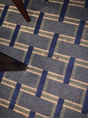 Odd red stains on the carpet