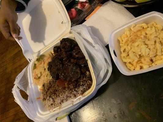 Large Oxtail platter with Rice & Peas, Cabbage and small side of Mac & Cheese