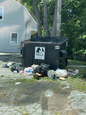 They left the dumpster like this after picking up trash