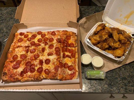 Pepperoni pizza and wings