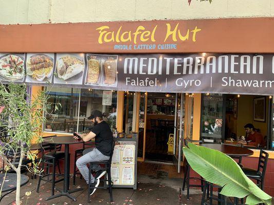 Cheerful and inviting patio. This owner is super kind and remembers his regulars.