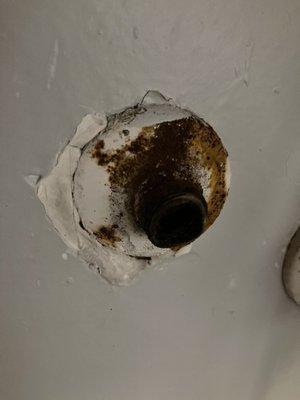 Picture of the corroded pipe that broke abs flooded my bathroom.