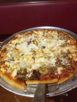 St. Christopher - Italian beef, pepperoni, mozzarella, ricotta, and giardiniera peppers.