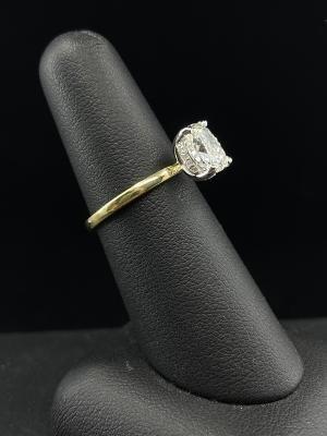 Elongated cushion cut with a hidden halo