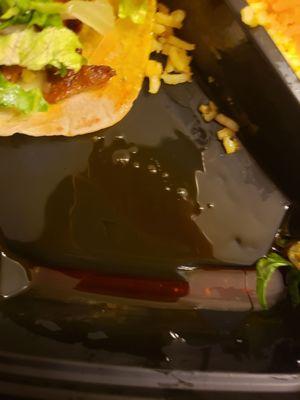 This grease had completely soaked thru one taco and yet there was still a huge pool of it in the bottom of the container:(