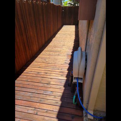 Side yard deck. Fresh stain still drying