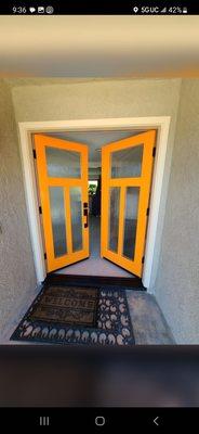 Newly installed doors with mango orange color.