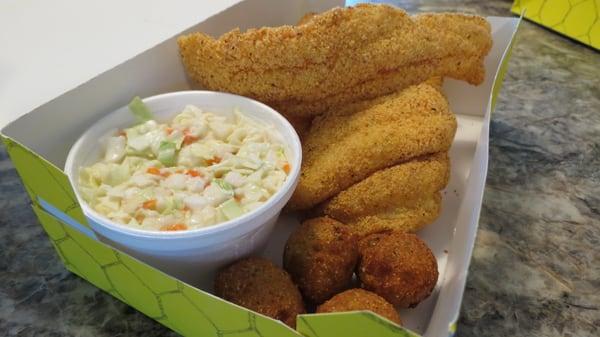 Fish fillets, hushpuppies, cole slaw